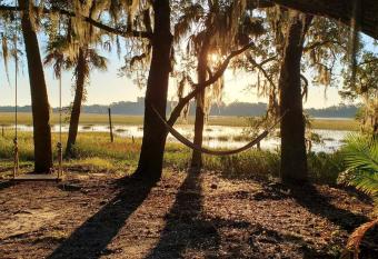 Secluded Tiny House by the Marsh with Hunting Island Beach Pass allows 18 year olds to book a room
