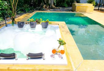 Luxury Home In Aguacatala has rooms with a private hot tub