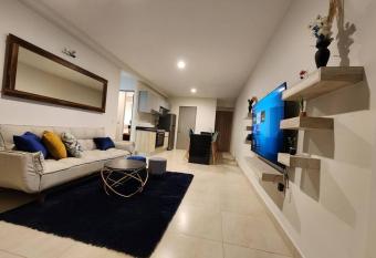 Hermoso departamento con jacuzzi has Balcony rooms