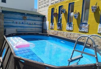 Cactus house,2 bedrooms,swimming pool,parking,few steps to beach,WIFI has Balcony rooms