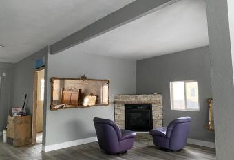 Cottage Adjoining House allows 18 year olds to book a room