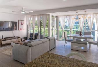 Pet-Friendly Pool Retreat with Luxury Hot Showers has rooms with a private hot tub