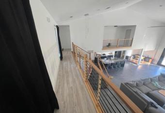 4 Bedroom House has rooms with a private hot tub