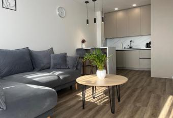 Saules apartamentai, free parking allows 18 year olds to book a room