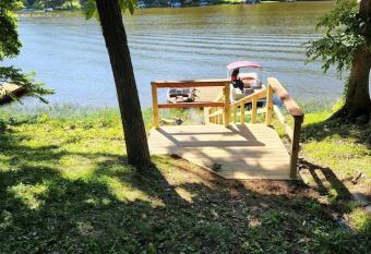 Lake shore home right on the water with private boat dock, A Shore Thing has Balcony rooms