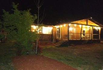 Paradise Mountain Getaway! has rooms with a private hot tub