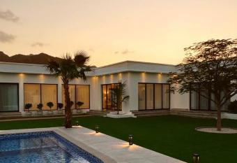 Quiet House villa has rooms with a private hot tub