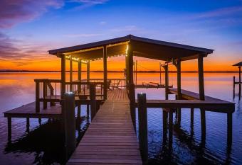 River Oaks Cottage NEW Riverfront Home-Bring Your Boat, Dock, Sunsets has Balcony rooms