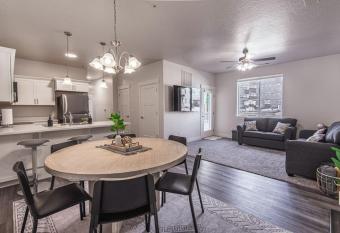 The Lehi Getaway Condo Unit with 3 BR, 2 BA and AC allows 18 year olds to book a room