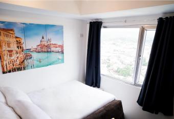 Modern Designed Studio Condo Near Ayala Centrio allows 18 year olds to book a room