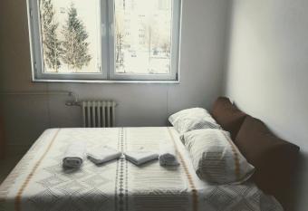 Cozy 2 room apartment has rooms with a private hot tub