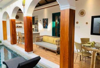 Bali inspired bungalow with private pool has Balcony rooms