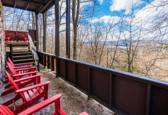 Stone Chalet - Amazing Views Hot Tub & Huge Deck has rooms with a private hot tub