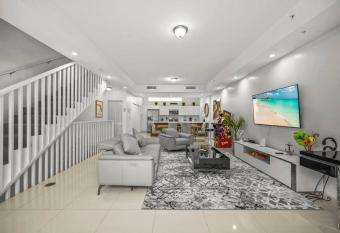 Modern 3 Story Town Home w/Rooftop Jacuzzi has rooms with a private hot tub