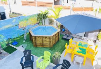 Maison de 3 chambres avec piscine privee spa et jardin clos a Vincendo Saint Joseph has rooms with a private hot tub