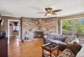 Mid-Century Vintage Brick Ranch Upstairs Guesthouse allows 18 year olds to book a room