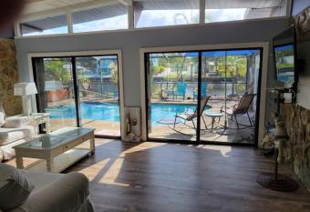 WaterFront Mid Century Cottage - Close to beach - 3 BR 3 BA has rooms with a private hot tub