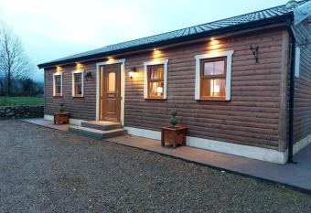 Luxurious Log Cabin with Lay-z Spa Hot Tub has rooms with a private hot tub