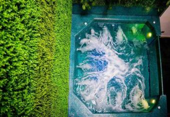 PARQUELLERAS11BEDROOM! POOL+Jacuzzi BEST LOCATION! has rooms with a private hot tub