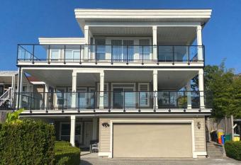 New two-bedroom legal suite with parking has Balcony rooms