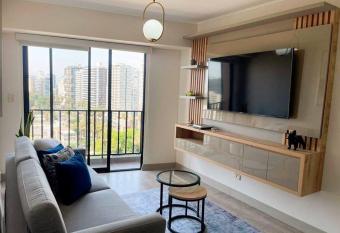 1BR Estreno Gimnasio Piscina CoWorking has rooms with a private hot tub