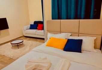 A Very Spacious Studio Furnished apartment in CBD Nakuru has rooms with a private hot tub