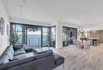 The Sunset Lane Waterfront Home has Balcony rooms