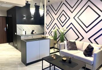 Apartament Elegance Hanza Tower has rooms with a private hot tub