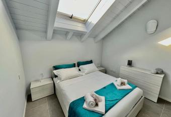 Prestigioso attico a passo Duomo by Revenue House has Balcony rooms