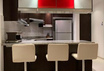 Departamento Diamond Beach has rooms with a private hot tub