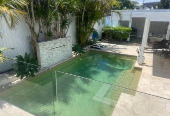 The lake view home has rooms with a private hot tub