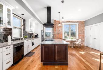 Industrial Historic Downtown Home has Balcony rooms
