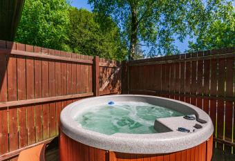 Bluebell Lodge 2 with Hot Tub has rooms with a private hot tub