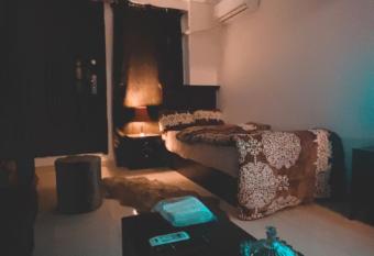 Restful and trendy apartment has rooms with a private hot tub