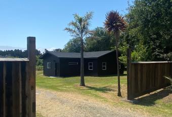 The Nook, Private Beach House has Balcony rooms