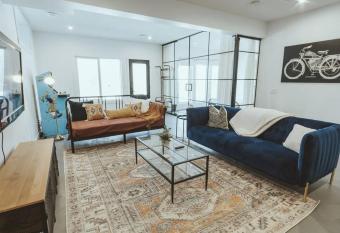 NYC Loft Inspired    12 mins to WEM    Vintage arcade allows 18 year olds to book a room