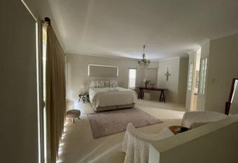 Walk to beach, luxe family home allows 18 year olds to book a room