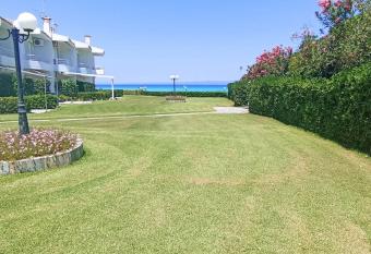 Aegean breeze apartment by Zen Realty management has Balcony rooms