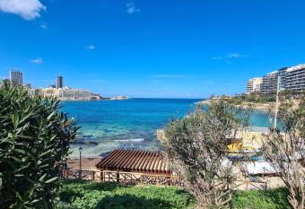 Cozy inside.City & beach outside has Balcony rooms