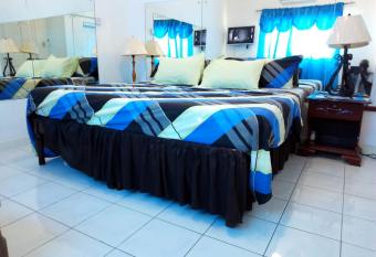 Fully Secured Gated 2 BR Home in Caribbean Estate. allows 18 year olds to book a room