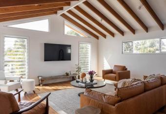 Blackbutt House - Luxe Family Retreat With Pool has Balcony rooms