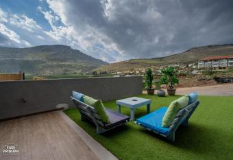                          -                                                                                  - Suites with a private pool in front of Mount Arbel near the Sea of Galilee allows 18 year olds to book a room