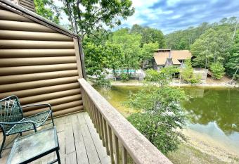 80BPD, Four bedroom, two 1 2 bath log-sided condo with lake view , garage condo has Balcony rooms
