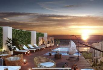 Moderno mini departamento de estreno has rooms with a private hot tub