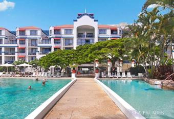 CALYPSO - Classic Resort Style Apartment - Steps from the Beach! has rooms with a private hot tub