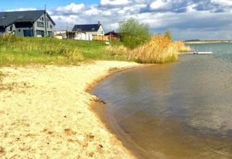 Ferienhaus / Ferienwohnung am Badesee n  he Leipzig mit Privatsstrand und Sauna has Balcony rooms