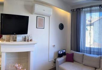 Apartman Happiness has rooms with a private hot tub