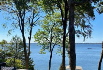 Newly Renovated 4B, 2.5 bath Lakefront home with South Grand Lake Views and dock has Balcony rooms