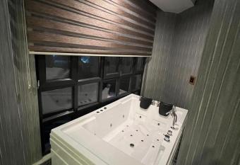 Beta Hotel has rooms with a private hot tub