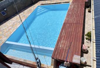 Maison de 2 chambres avec piscine partagee terrasse et wifi a Le Moule a 5 km de la plage has Balcony rooms